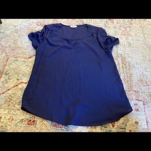 navy blue short sleeve blouse with pink buttons